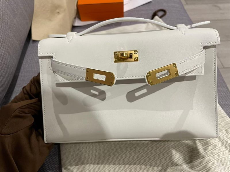 Hermès Kelly Pochette White Swift Gold Hardware